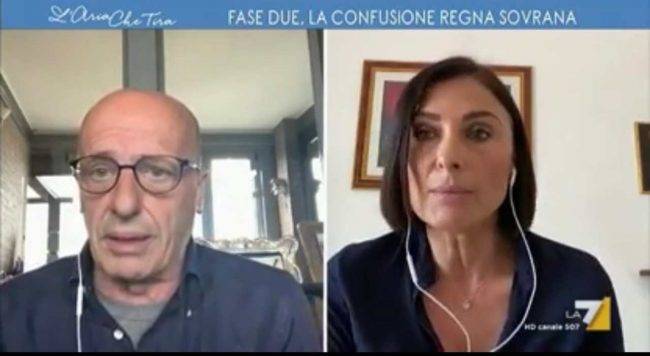 Alessandro Sallusti e Alessia Morani (fonte la 7)